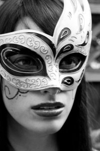 The Enigma of the Striking,  Masked Woman in Black