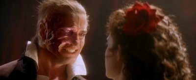 Christine snatches away the Mask of the Phantom of the Opera.