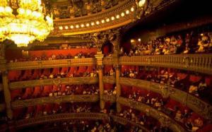 The  massive and exquisite chandelier in the Paris Opera House.