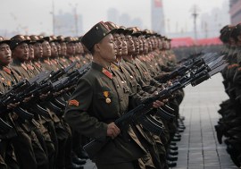 North Korea Succession (1945 - present day)  North Korean soldiers march during a massive military parade marking the 65th anniversary of the communist nation's ruling Workers' Party in Pyongyang, North Korea on Sunday, Oct. 10, 2010. This year's celebration comes less than two weeks after Kim Jong Il's re-election to the party's top post and the news that his 20-something son would succeed his father and grandfather as leader.