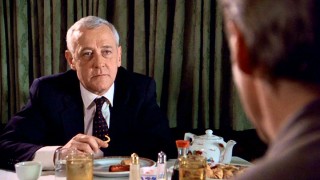 John Shaughnessy (John Mahoney), the corrupt State's Attorney threatens Vail if he dares to reveals his political secrets in the open court.